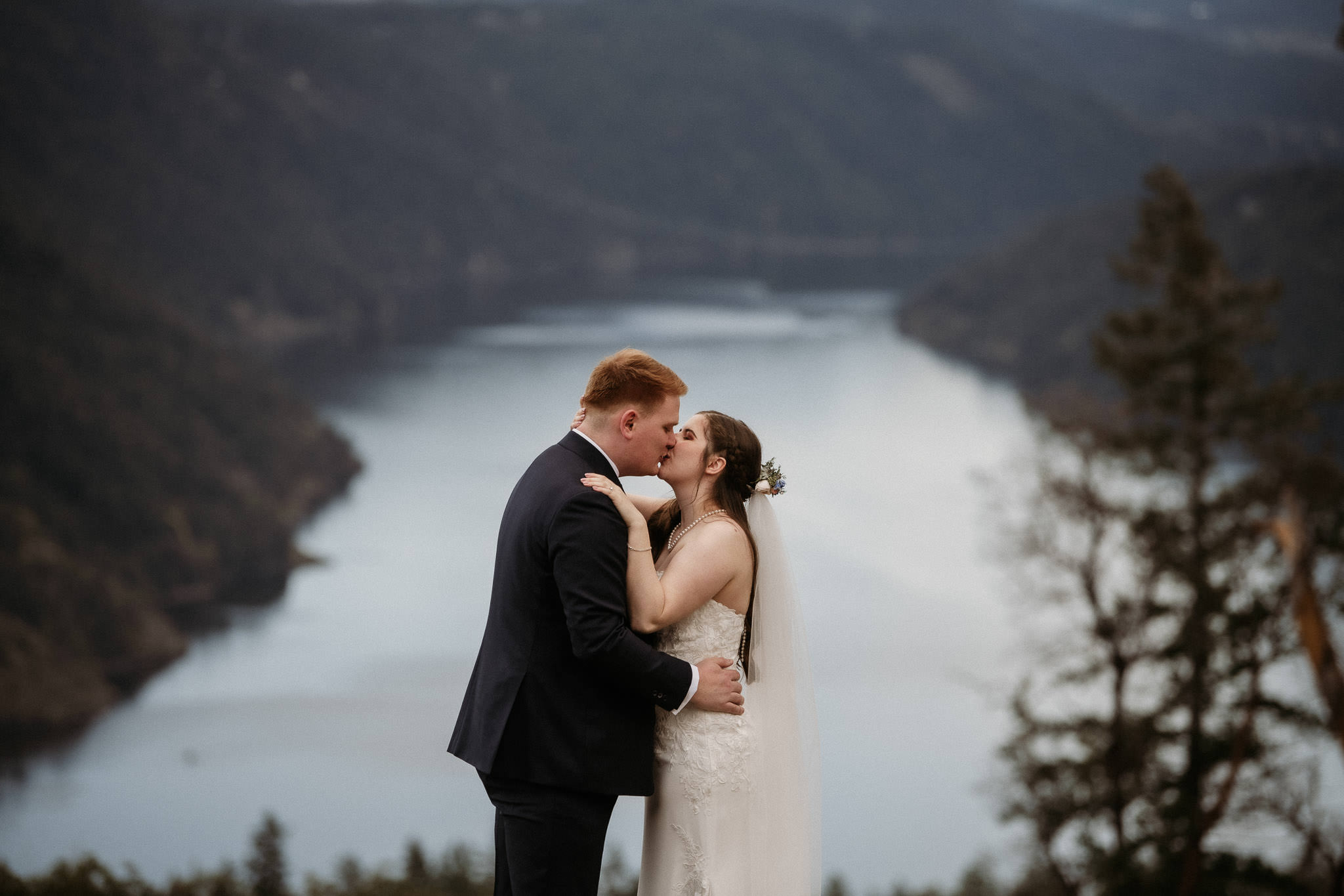 Wedding Photographer Victoria Villa Eyrie Weddings Bride and Groom Wedding Photo kissing overlooking sound