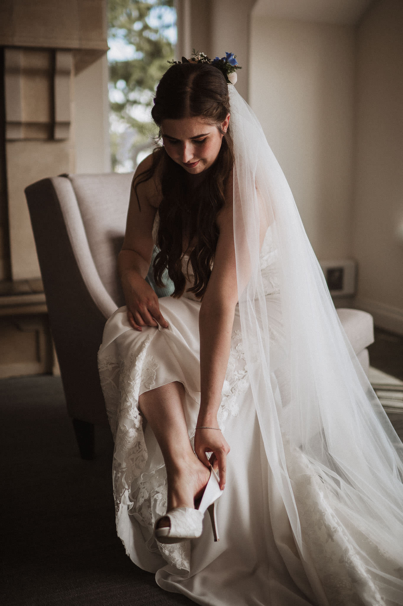 Wedding Photographer Victoria Villa Eyrie Weddings Details Bride Putting on Shoes